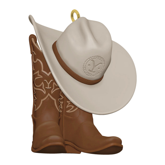 Decorative ornament with cowboy hat and boots on a white background