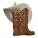 Decorative ornament with cowboy boots and a hat on a white background