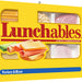 Lunchables packaging with images of turkey and ham slices on a yellow background