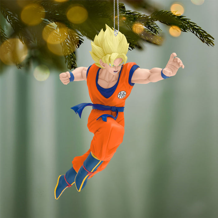 Character figurine in orange and blue outfit hanging from a Christmas tree.