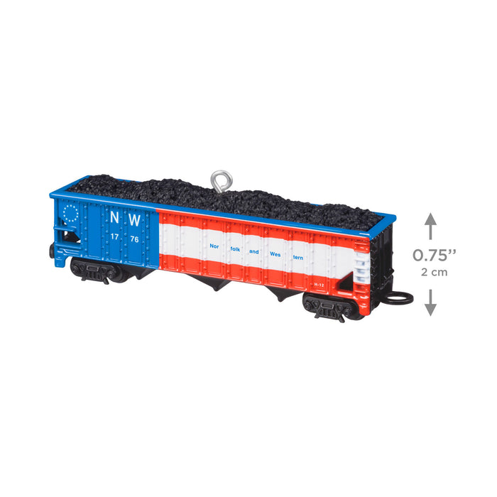Model train car with blue, red, and white design on a white background