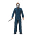 Action figure in blue coveralls with a white mask holding a knife on a white background