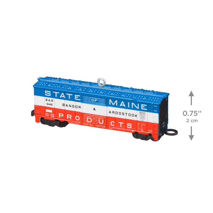 Model train car with 'State of Maine Products' branding on a white background