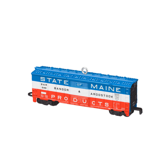 Model train car with 'State of Maine Products' text on a white background