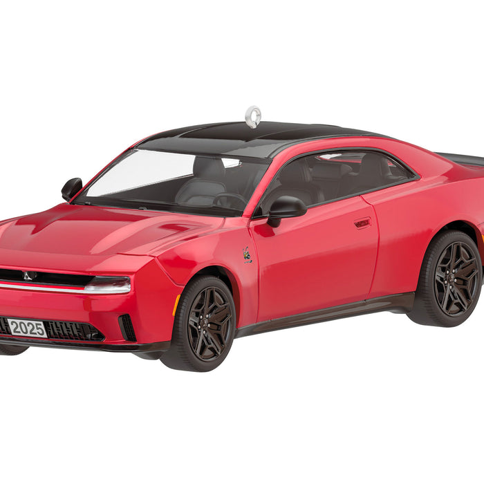 Red sports car with black roof on a white background