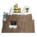 Toy train set on a wooden track with snow-covered houses and trees.