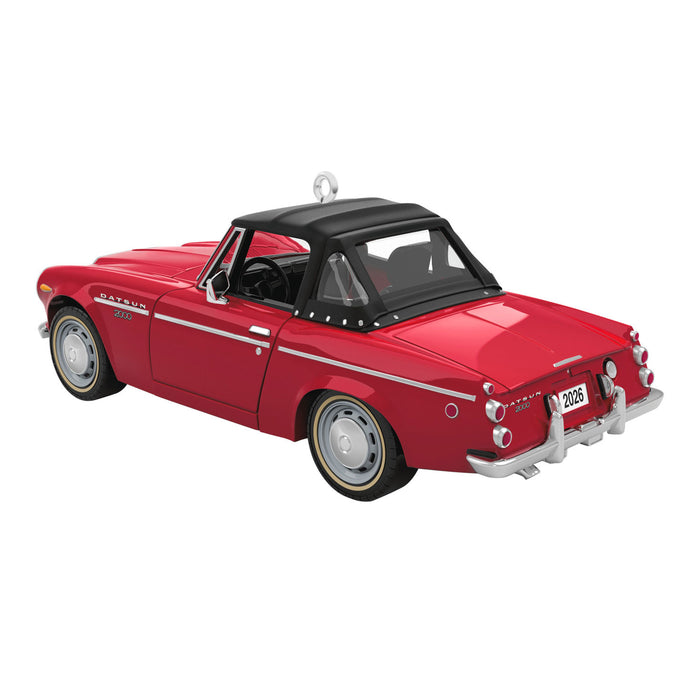 Red vintage car model on a white background