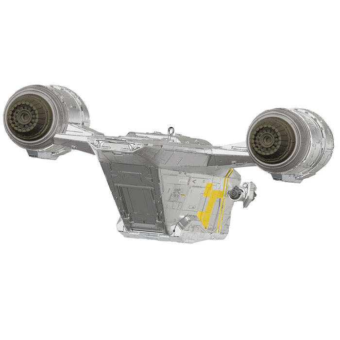 Clear model of a spaceship with visible internal components on a white background