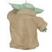 Baby Yoda figure with green head and beige body on a white background