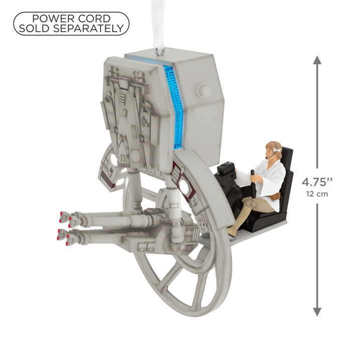 Toy spaceship with a figure inside, dimensions indicated, power cord sold separately text.