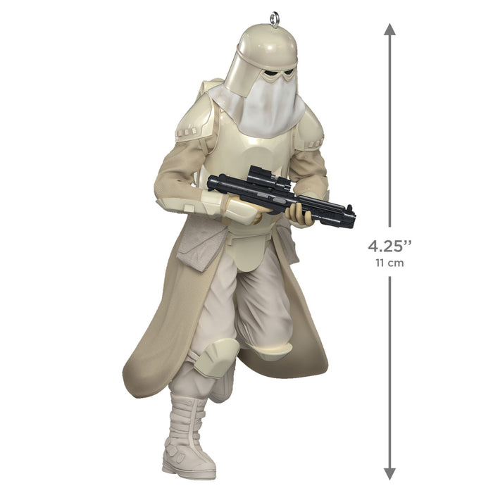 Snowtrooper figure with a gun, measurement label on a white background