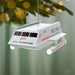 USS Enterprise model hanging on a Christmas tree with a festive background