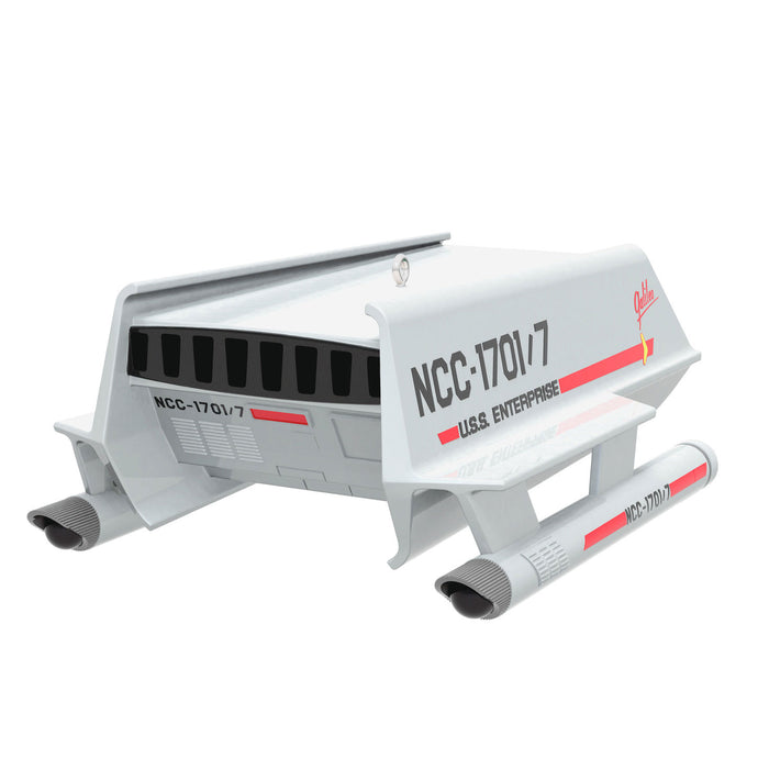 Model of a spaceship engine with 'NCC-1701/7' and 'USS Enterprise' text on a white background
