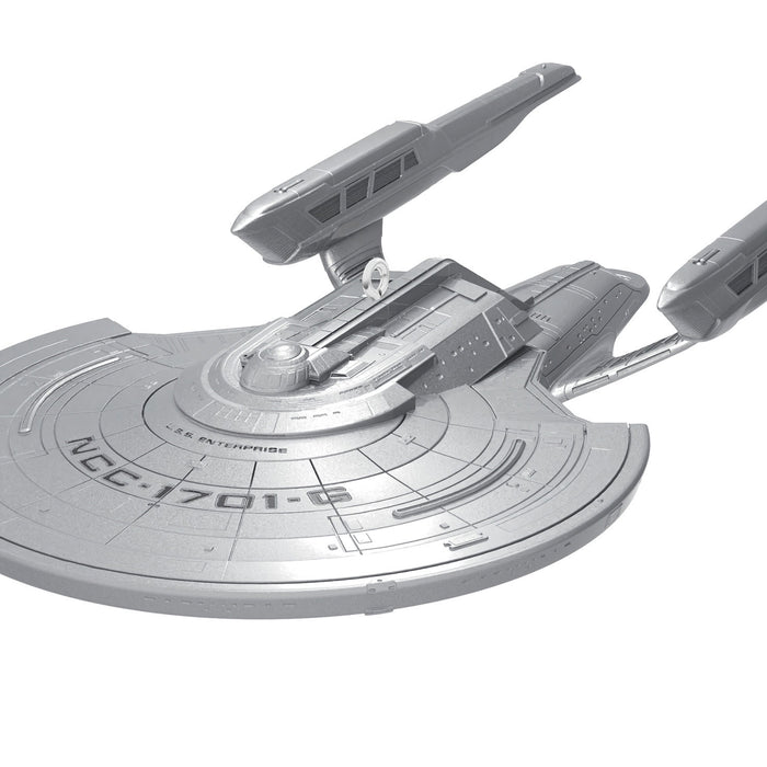 Model of a starship with 'Enterprise' and 'NCC 1701-D' text on a white background