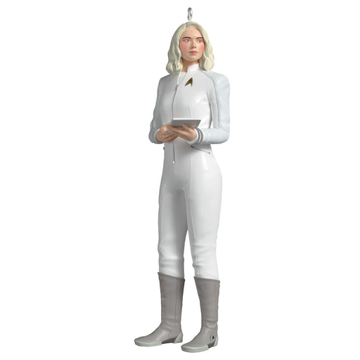 Decorative figure of a character in a white uniform with a tablet on a white background