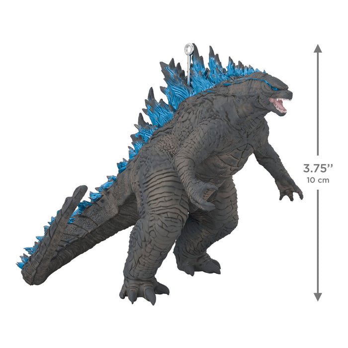  Godzilla figurine with blue spikes on a white background