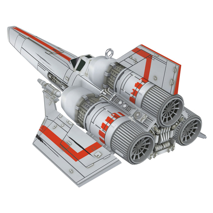 Model of a spaceship with red and gray design on a white background