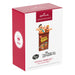 Cocoa Pebbles The Flintstones Christmas ornament packaging on a white background