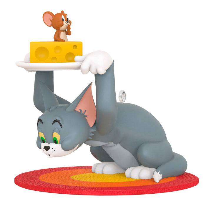 Animated cat character figurine with a mouse on cheese, on a white background