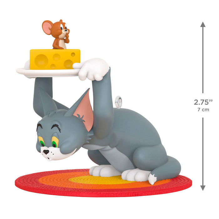 Animated cat character figurine with a mouse and cheese on a white background