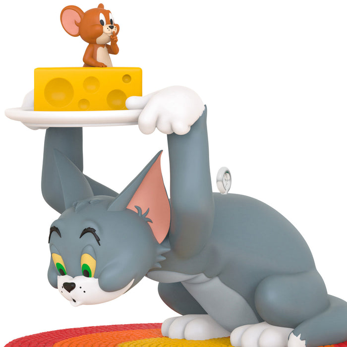 Animated cat and mouse figurine with cheese on a white background