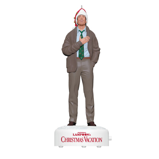 Statue of a man in a sweater and Santa hat on a 'National Lampoon's Christmas Vacation' box.