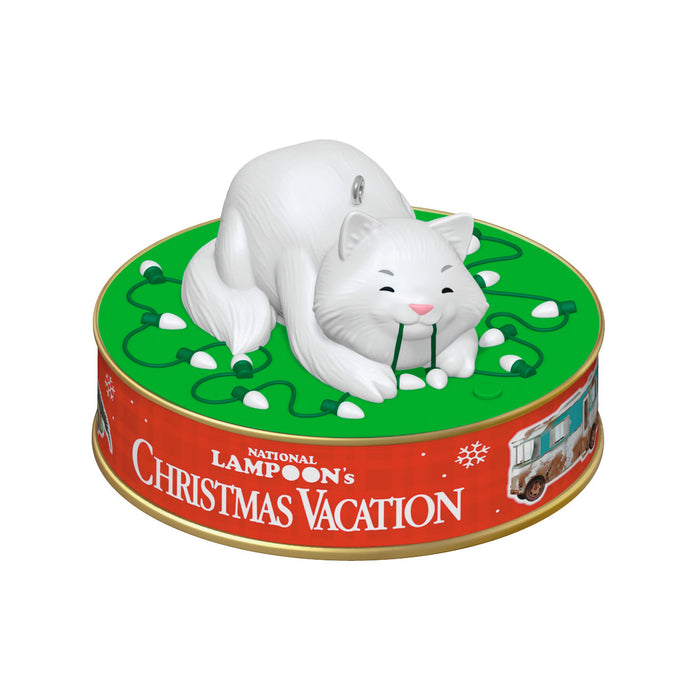 Decorative figurine of a cat on a 'National Lampoon's Christmas Vacation' themed can.