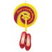 Decorative ornament with red shoes, yellow ribbon, and circular design on a white background