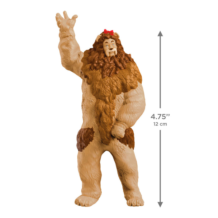Toy figure of a creature with dimensions indicated on a white background