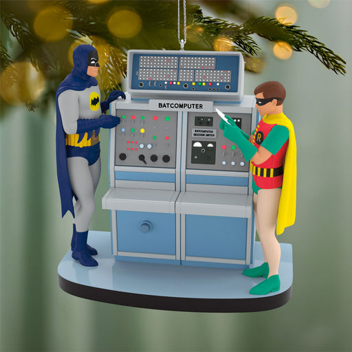 Christmas ornament featuring Batman and Robin with the Batcomputer on a green background.