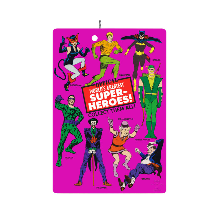 Vintage-style superhero action figures on a pink card with text
