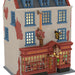 Model of a building with a store front labeled 'Quality Quidditch Supplies' on a white background