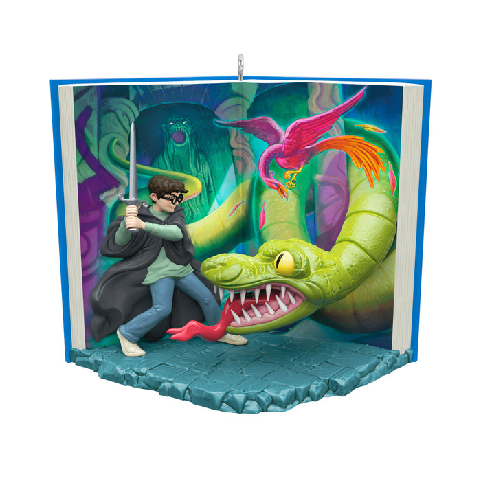 Ornament with a fantasy scene featuring a character with a sword, a dragon, and a phoenix.