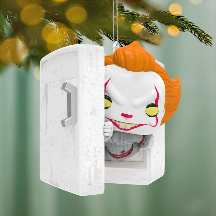 Decorative Christmas ornament with a character in a white box against a festive background