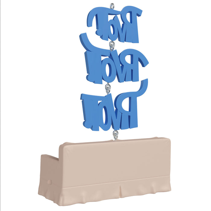 Blue decorative letters on a beige stand against a white background