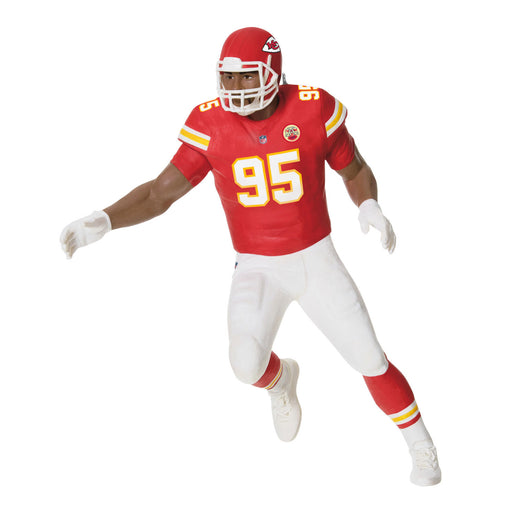 Football player in a red and white uniform with number 95 on a white background