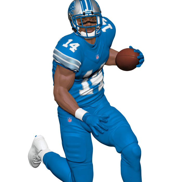 Football player in blue uniform with number 14 holding a football on a white background