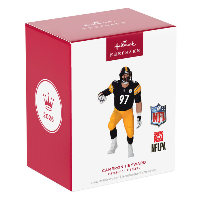 Hallmark Keepsake Christmas ornament packaging featuring a football player in a black and yellow uniform.