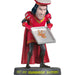 Statue of a character in a red outfit holding a tray with a gingerbread man on a white background.