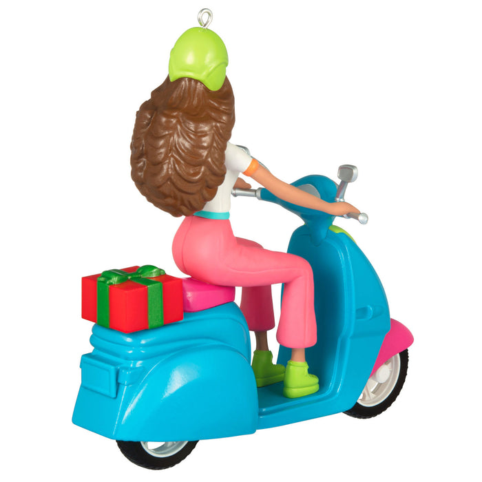 Decorative ornament of a person on a scooter with gifts, on a white background