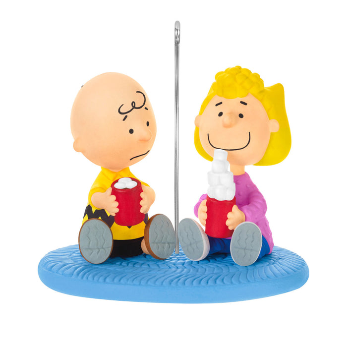 Two cartoon characters sitting on a blue base with a white background