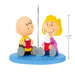 Two cartoon characters sitting on a blue base with a measurement indicator.