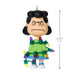 Character figurine with Christmas lights, dimensions indicated on a white background