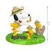 Snoopy and Woodstock figurine with hats on a green base, featuring dimensions.