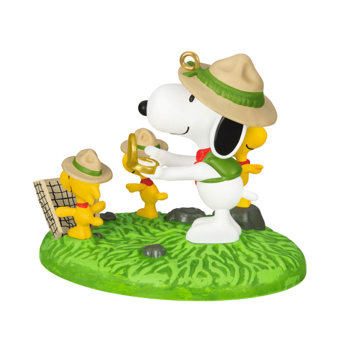 Snoopy and Woodstock figurine on  a camp sight on a white background