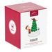 Hallmark Peanuts Christmas ornament packaging with a tree and character on a white background