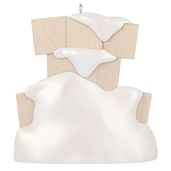 White cloud-shaped cushion with wooden backrest on a white background