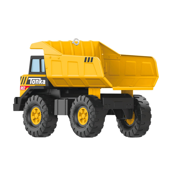 Yellow toy dump truck with black wheels on a white background