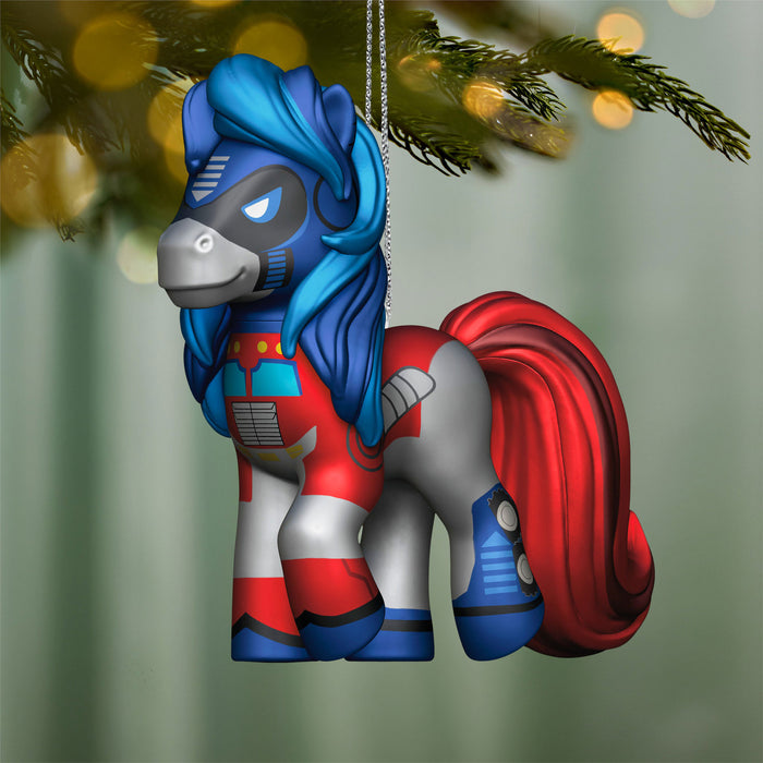 Decorative ornament shaped like a stylized horse with blue and red colors, hanging on a tree.