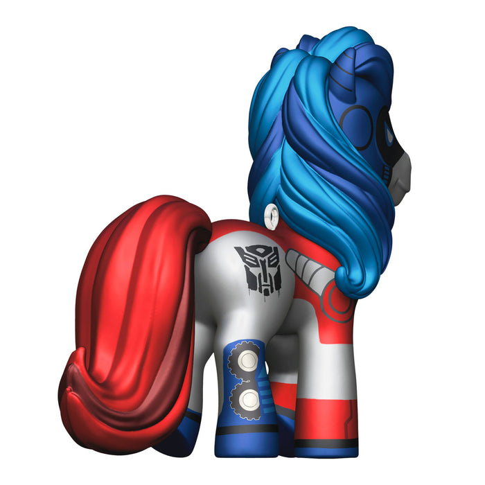 Transformers-themed toy figure with red, blue, and white colors on a white background